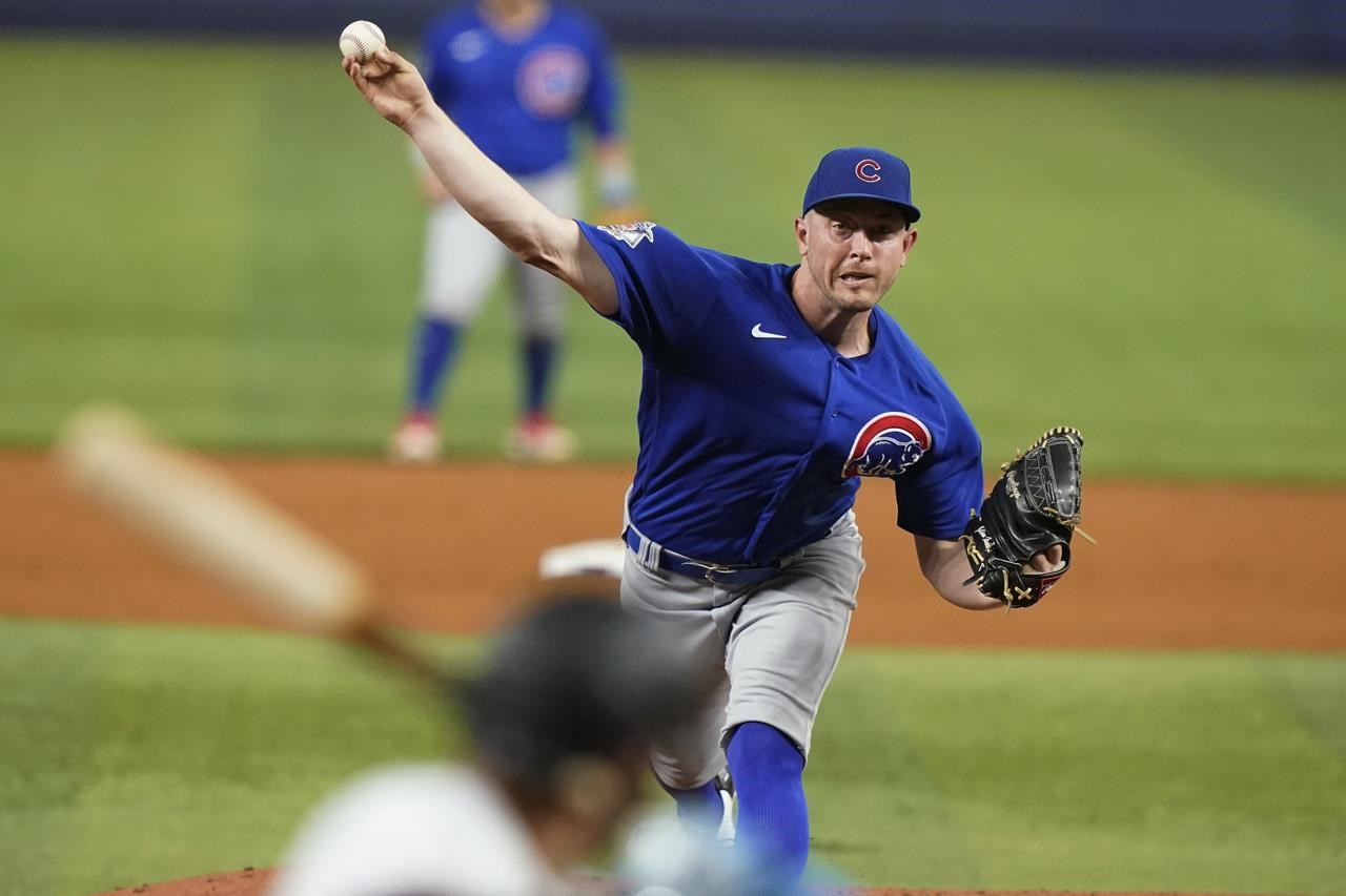 Bote inscrit les deux courses, les Cubs battent les Marlins 2-1